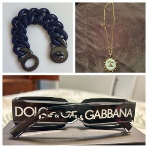 Dolce & Gabbana Sunglasses. Chanel Necklace. Marc Jacobs Bracelet.